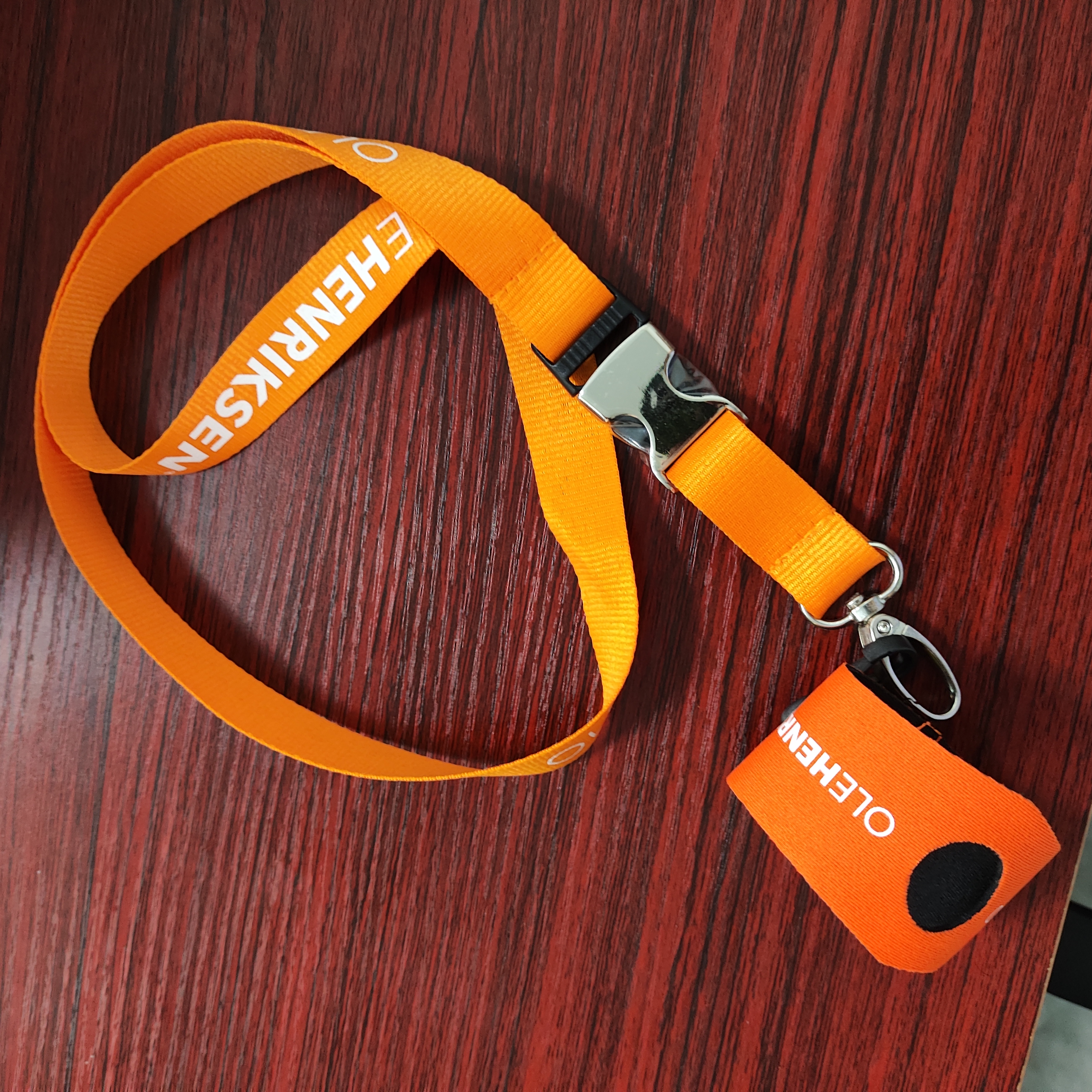 Customized lanyard with breakaway clasp